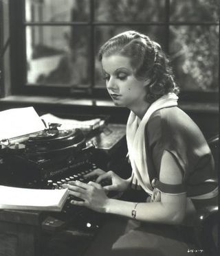 Jean_harlow_1932_red_head_typewriter