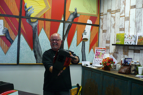 Bookshop Owner With A Chainsaw